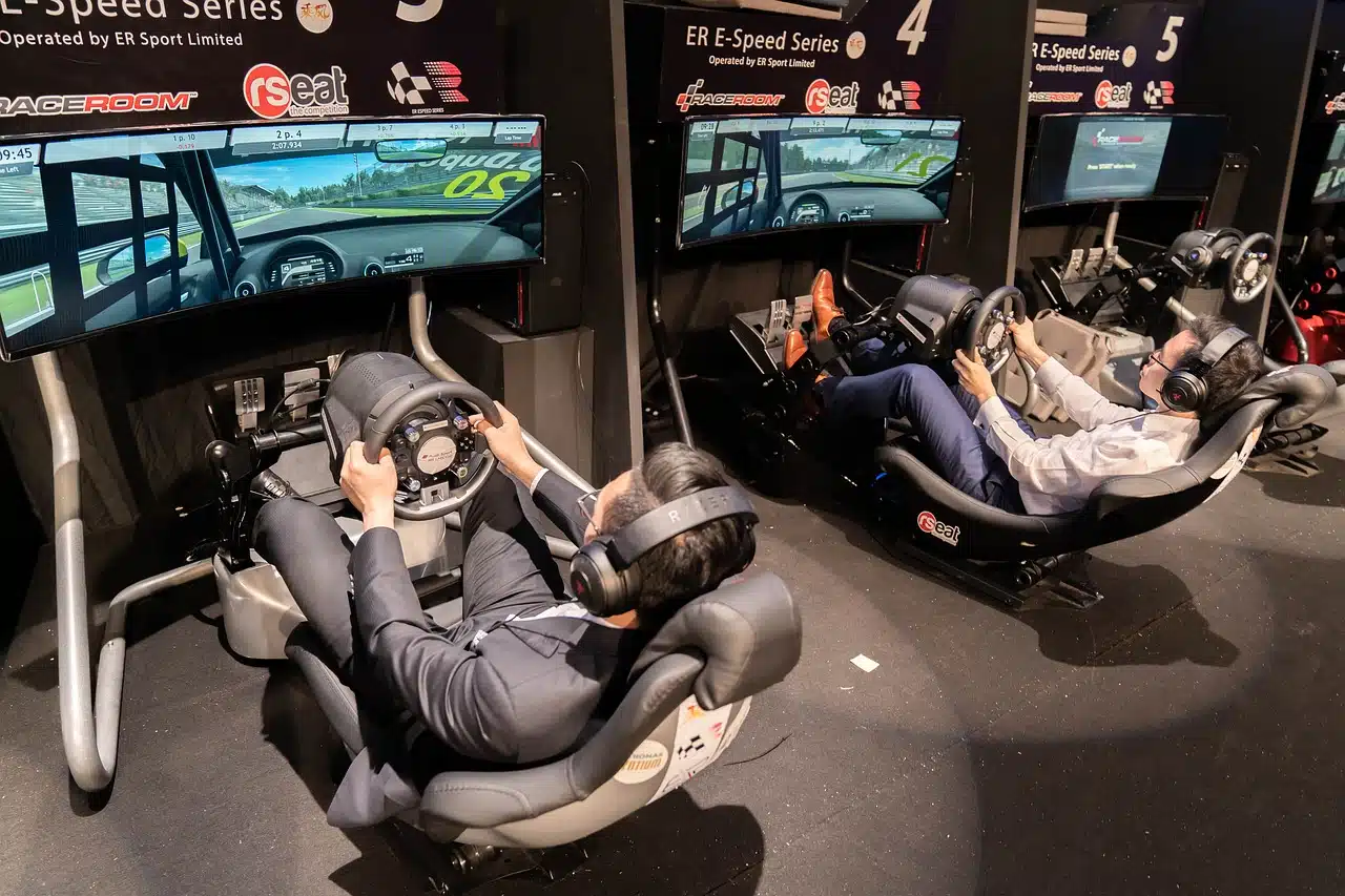 men playing a racing game simulator