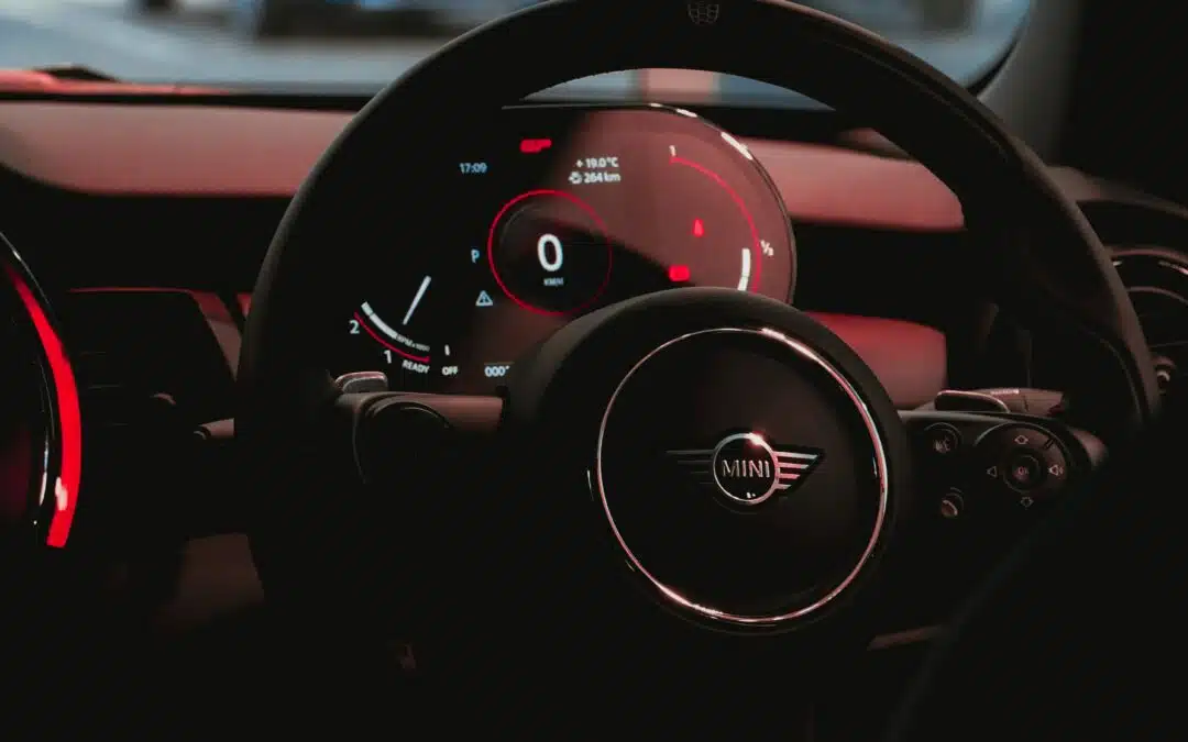 Mini car's steering wheel close-up, showcasing Groovy Gecko's Business-to-Dealer live streaming service for enhanced brand engagement